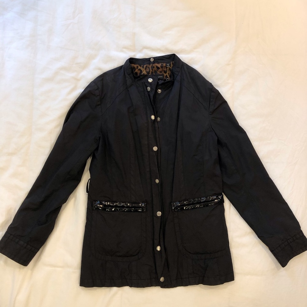 Waterproof black jacket with leopard print liner
